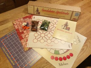 Spielmaterial des Brettspiels Gandubans Spieletruhe von GeMinis Games